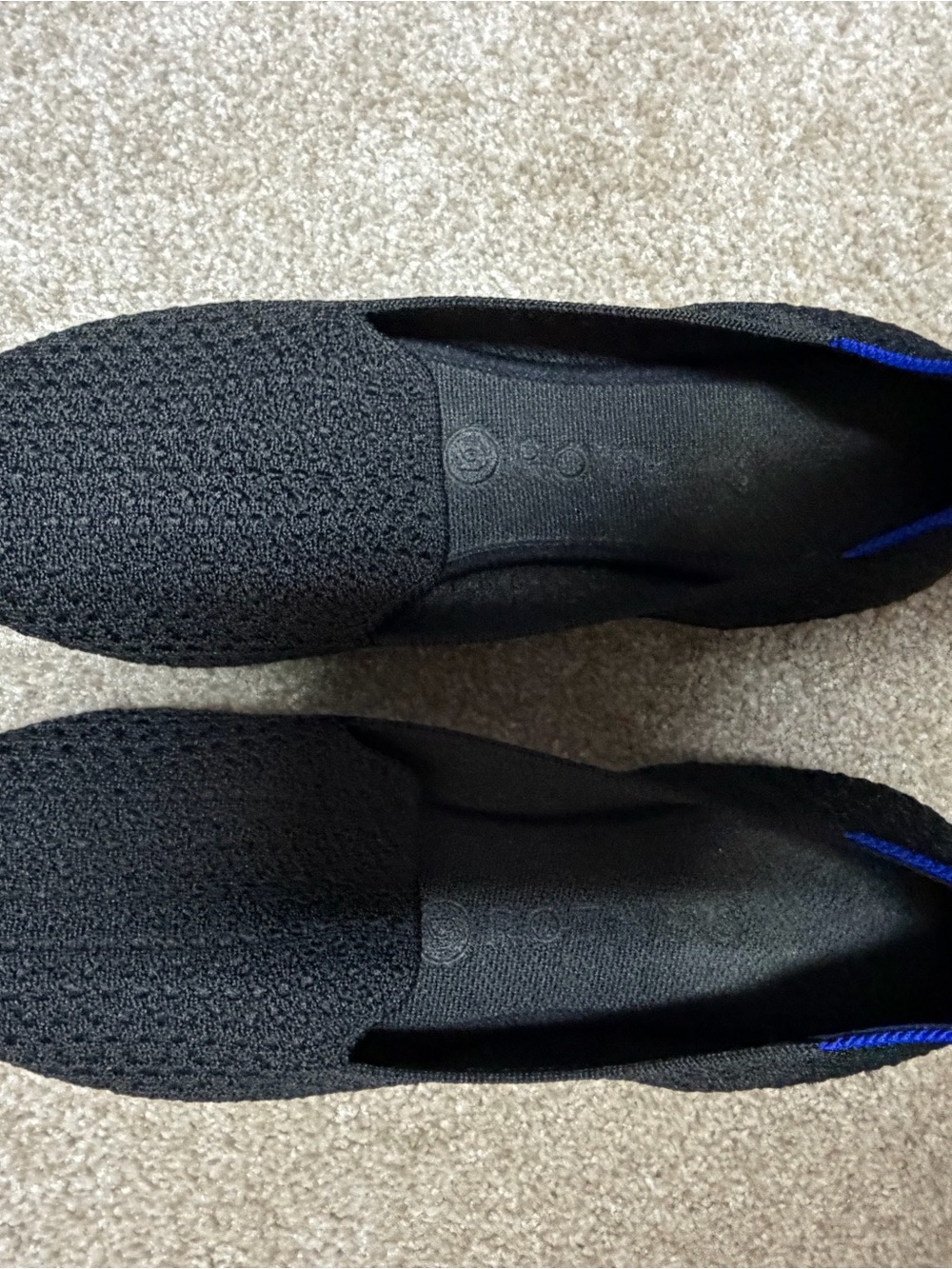 Rothy's Black Knit Slip-On Flats with Blue Heel Accent